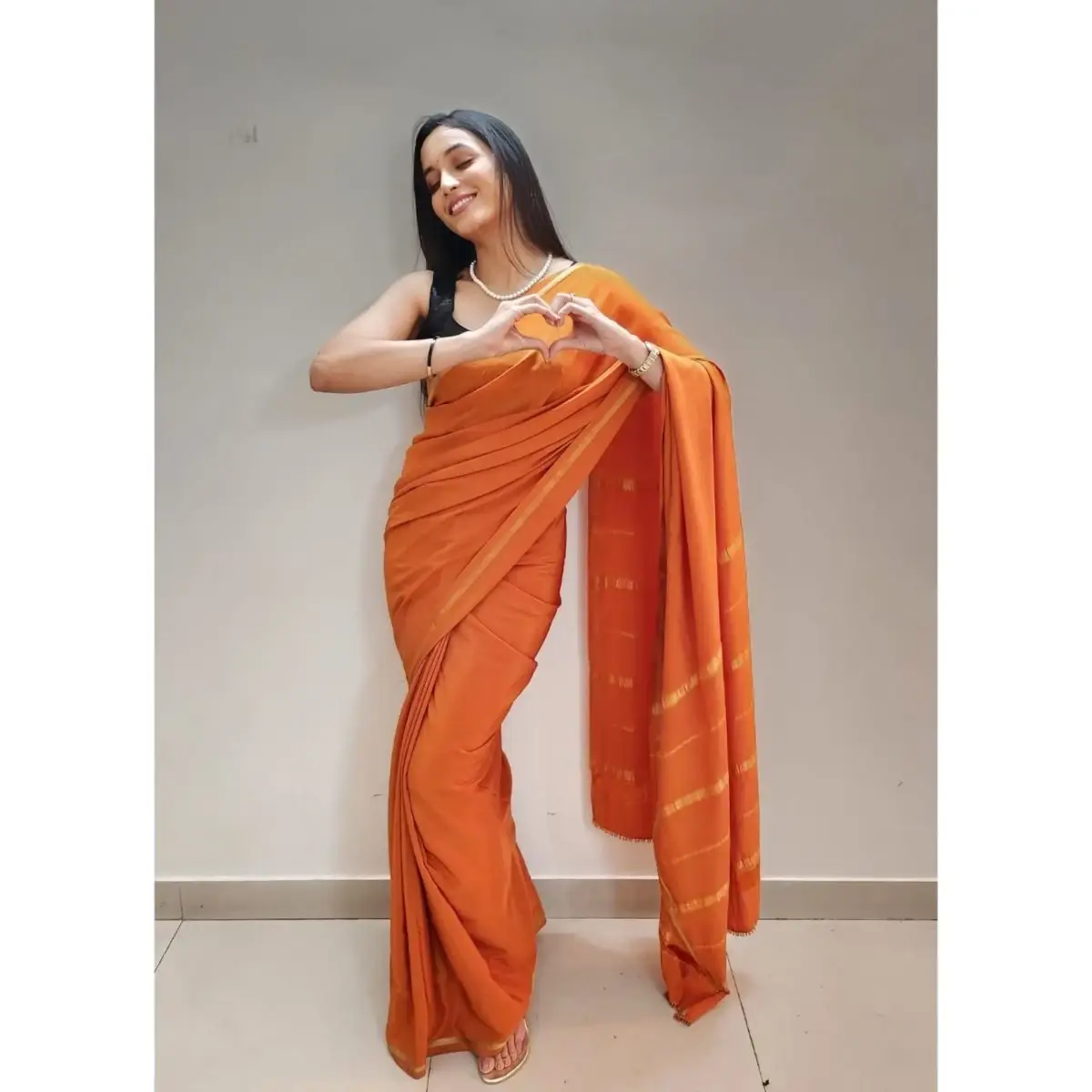 SRINIDHI SHETTY IMAGES IN SLEEVELESS ORANGE SAREE 4